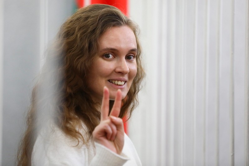 Belarus journalist Katsiaryna Andreyeva, shown here inside a defendant’s cage in a Minsk courtroom on February 18, 2021, was on the verge of completing a two-year prison term when a court sentenced her to another eight years on a charge of ‘giving away state secrets.’ (AP Photo)