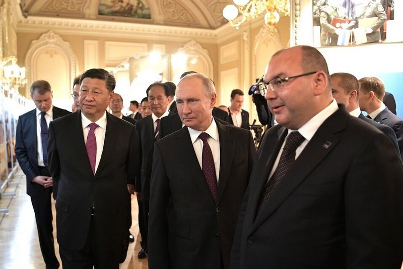Міхайлаў (крайні справа) з Пуціным. Фота: Kremlin.ru
